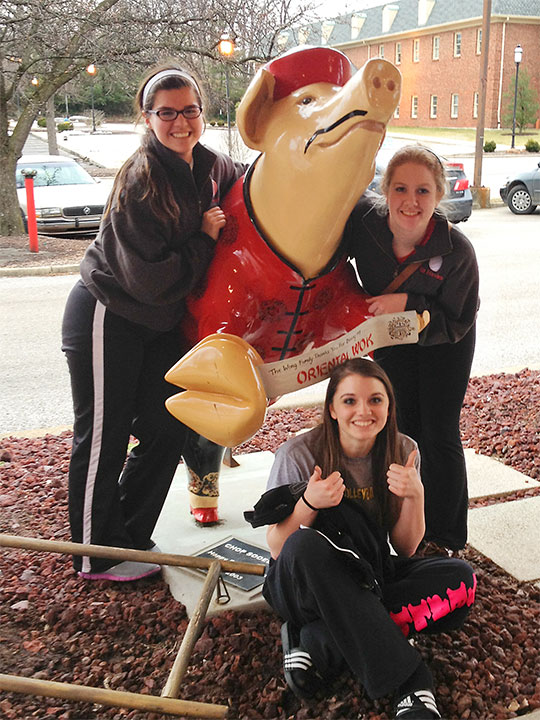 Victorious members of the 18 Hawks at the Oriental Wok in Crescent Spring, Kentucky, after the tournament. Natalie Carley is on the left, Kaitlin Zehler on the right, and Holly Richardson is seated.